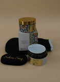 Cosmetic jars with decorative labels on a table Cosmetic jars with decorative labels on a table