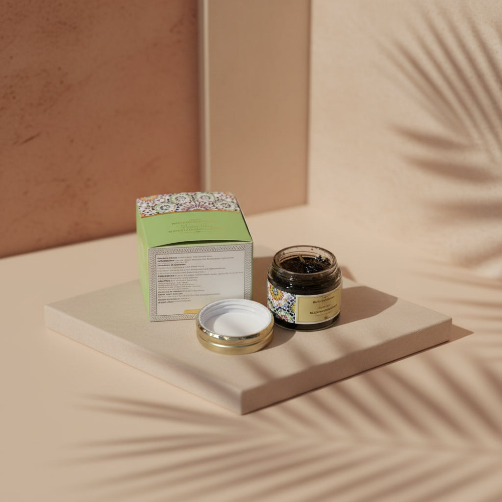 Cosmetic jar, lid, and box on a beige surface with soft shadows Cosmetic jar, lid, and box on a beige surface with soft shadows