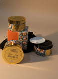 Three jars of soap with decorative labels on a neutral background Three jars of soap with decorative labels on a neutral background