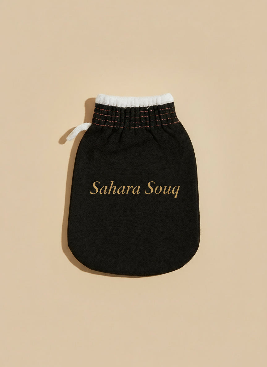 Black shower cloth kessa on a patterned surface Black shower cloth kessa on a patterned surface
