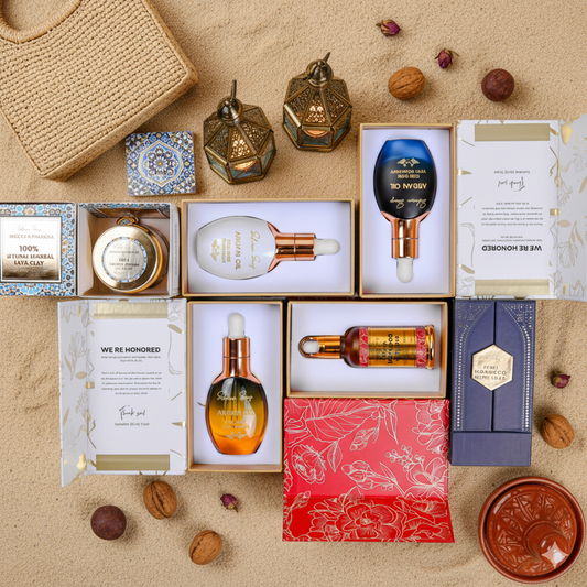 Collection of skincare products and packaging on a beige surface with decorative elements.