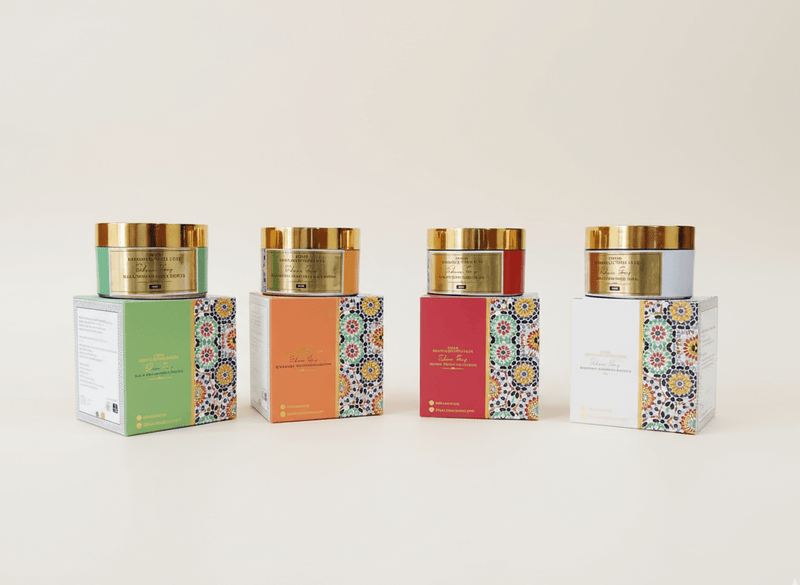 Set of decorative jars with colorful labels on a white background